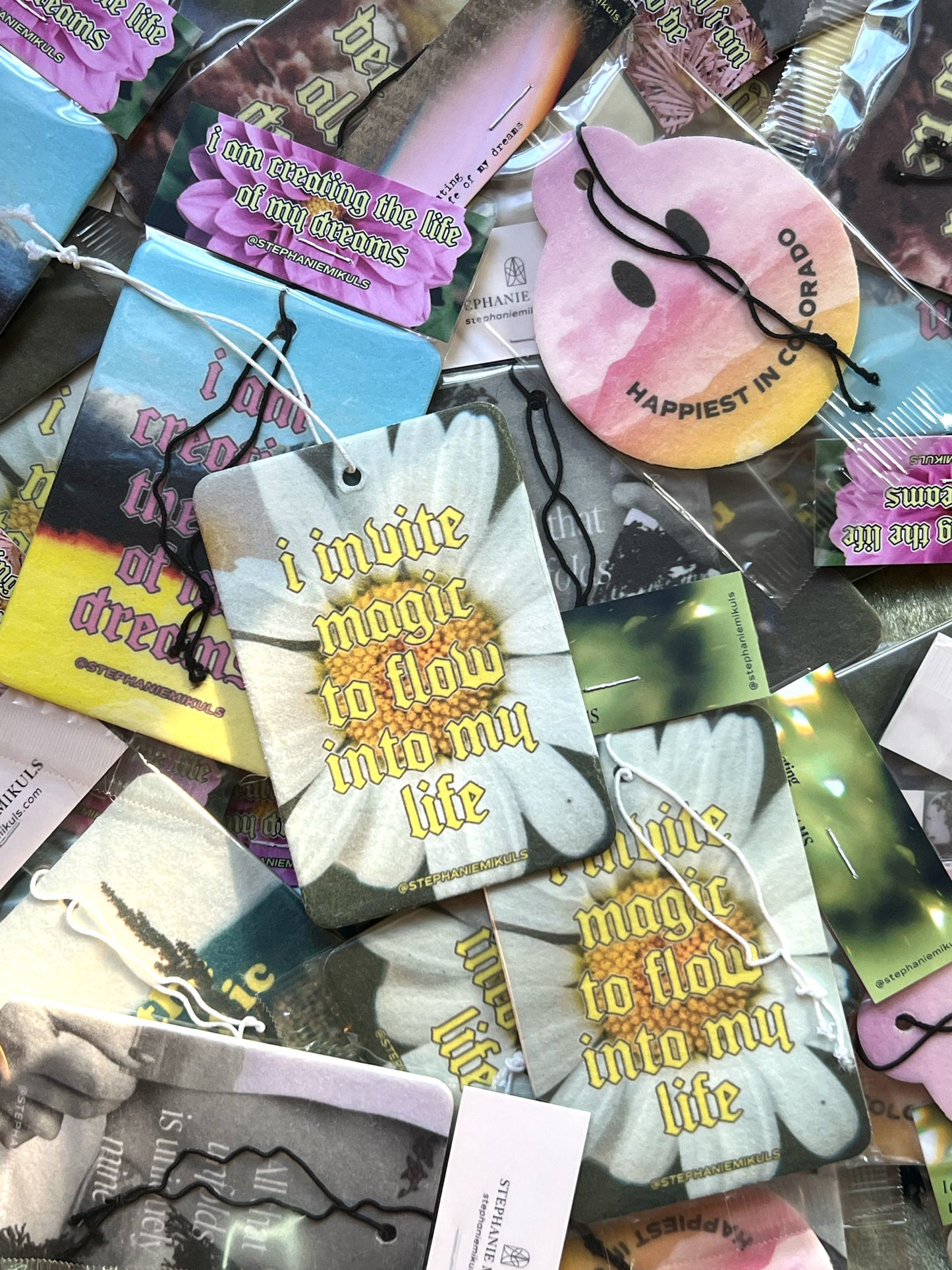 ‘I invite magic to flow into my life’ air freshener