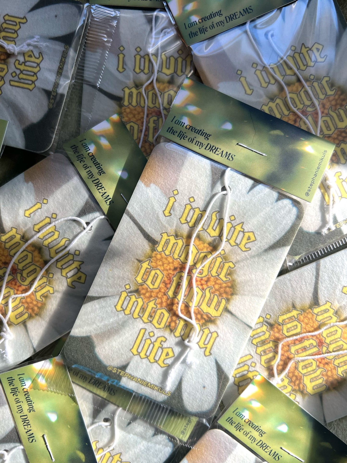 ‘I invite magic to flow into my life’ air freshener